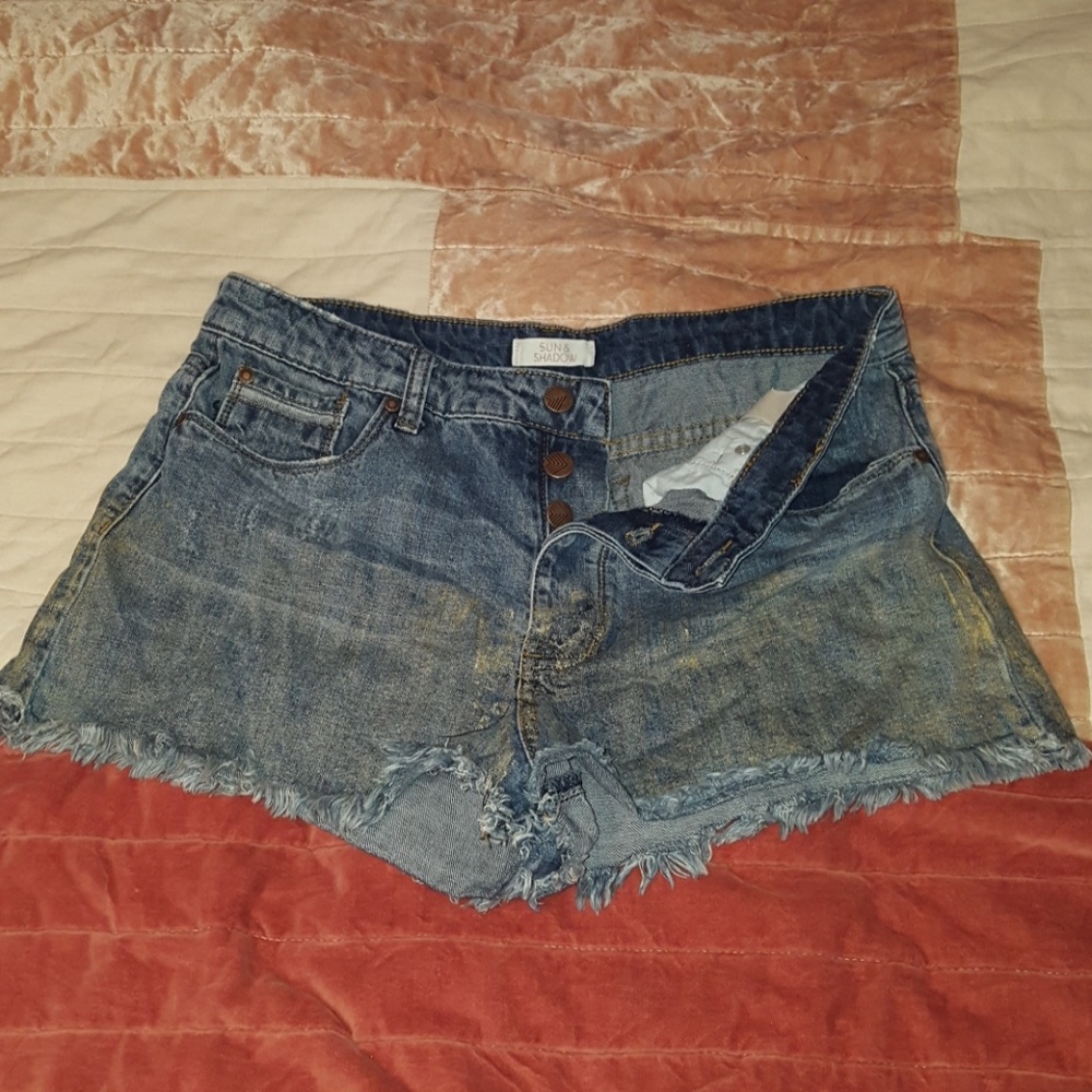 Button fly mid rise distressed dip painted shorts